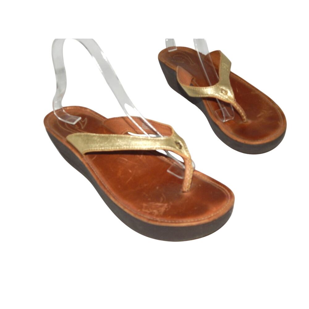 OluKai Gold and Brown Wedge Flip Flops